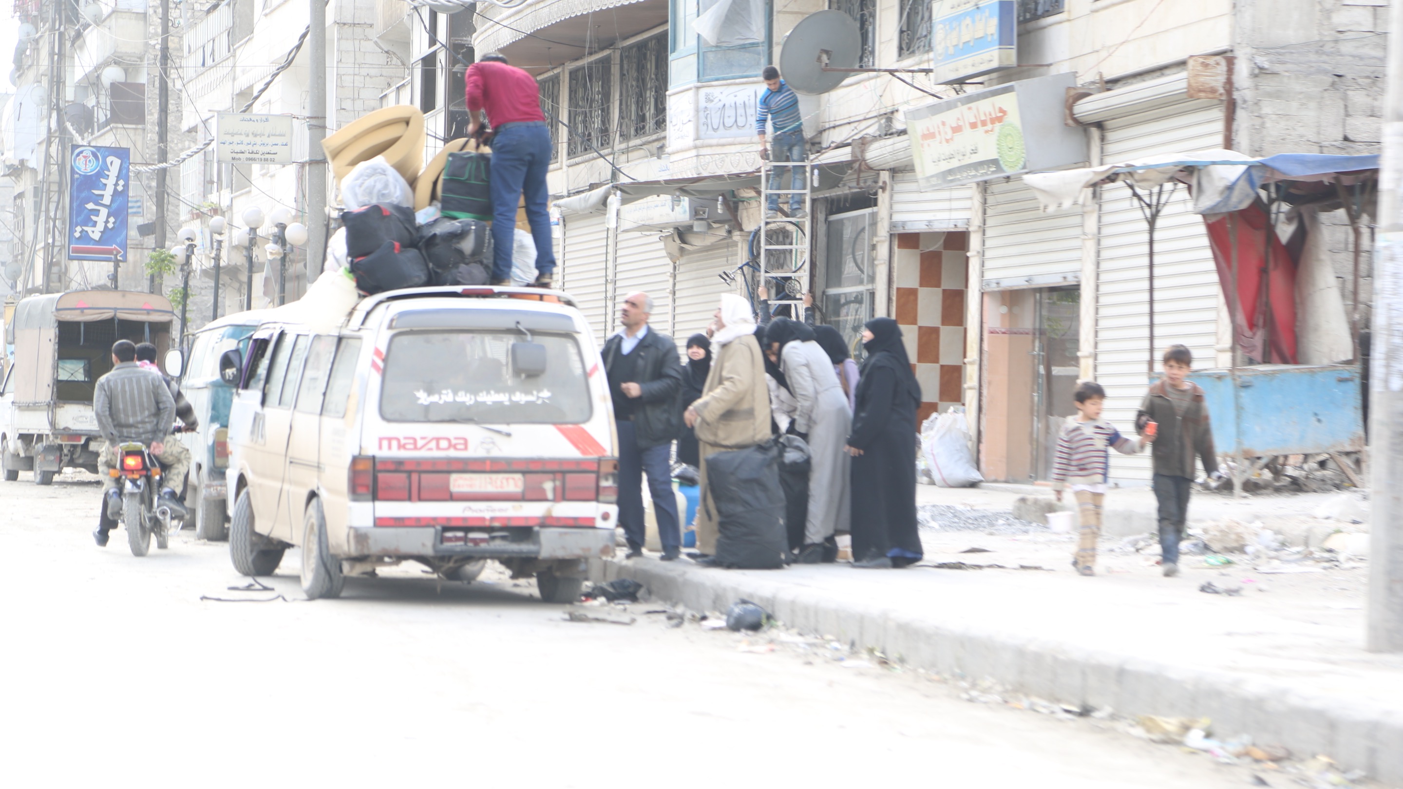 A family displaced due to shelling in Aleppo in al-Ferdaws neighbourhood. Photo taken by: Hussam Kuwaifatiyeh