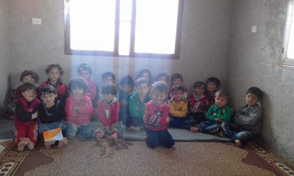 Children in the makeshift kindergarten in Hass. Photo: Jud Mustafa